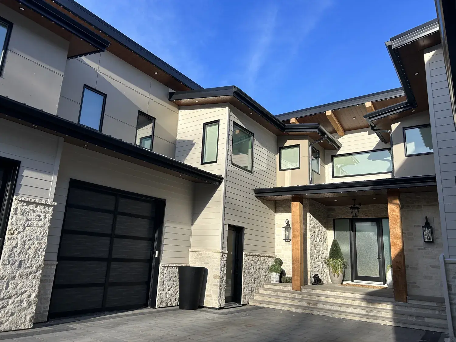 Close-up of James Hardie fibre cement siding installation on a new-build home near Lacombe